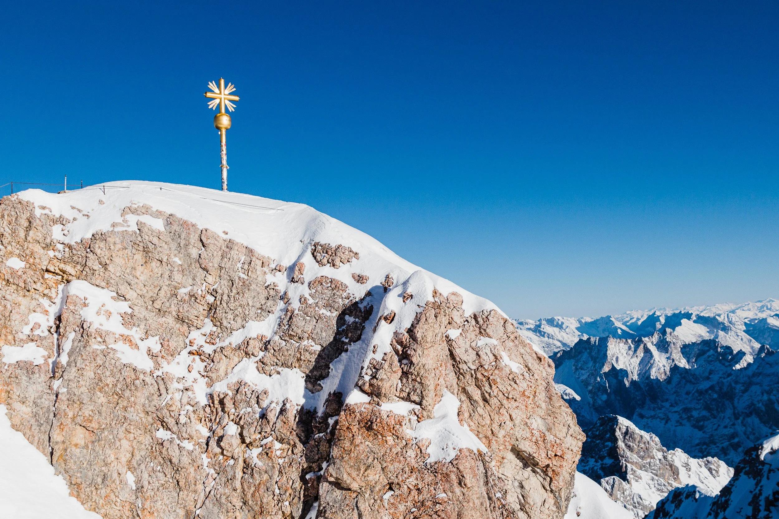 Golden cross on the summit of the Zugspitze